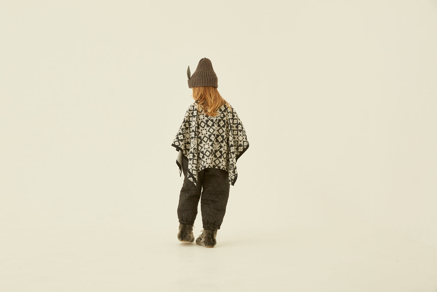 Eight Star Jaquard Poncho Black