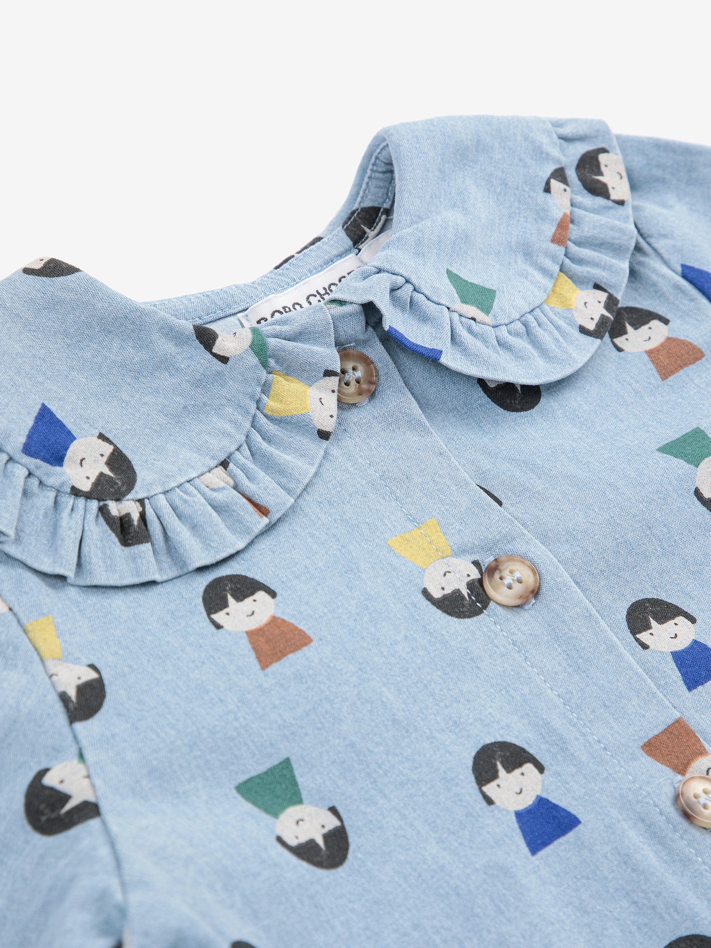 Game Pawns All Over Faces Print Button-Up Light Denim Blouse Light Blue